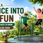 Children jumping happily on an outdoor trampoline surrounded by greenery at Jungle Trail Noida, showcasing a fun and family-friendly adventure park experience with wildlife-inspired sculptures in the background.