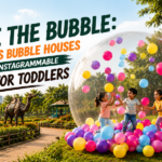 "Kids enjoying a bubble house filled with colorful balloons at Jungle Trails, a fun outdoor play attraction for toddlers and families, perfect for Instagram-worthy photos and memorable experiences."