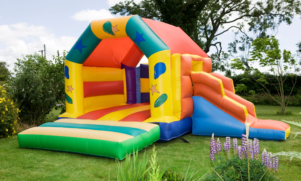 colorful Bouncy Castle surrounded by nature