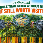 Jungle Trail Noida without rides: entrance gate with two elephant statues decorated with marigold garlands