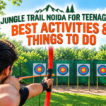Teenager enjoying archery at Jungle Trail Noida adventure park.
